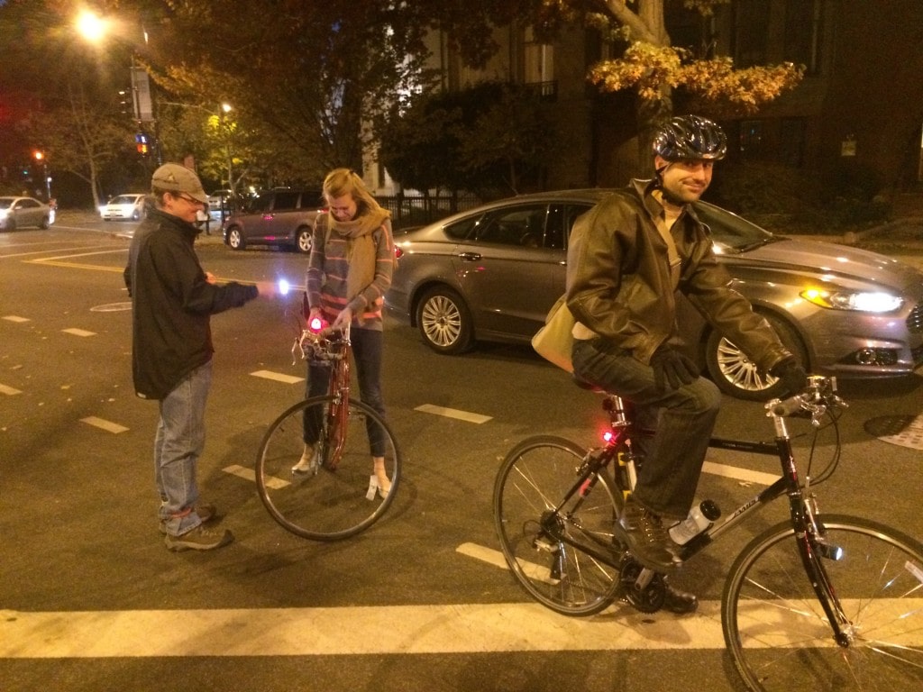 Phill helps to bicyclists riding at night without lights. 